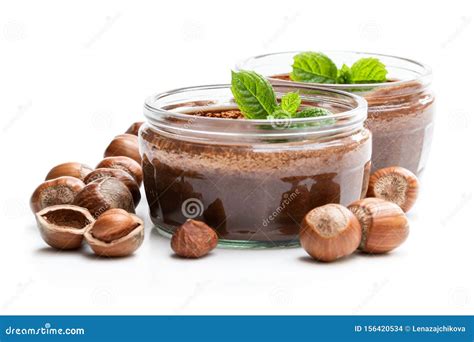 Homemade Chocolate Hazelnut Praline In Glass Jar Isolated On White