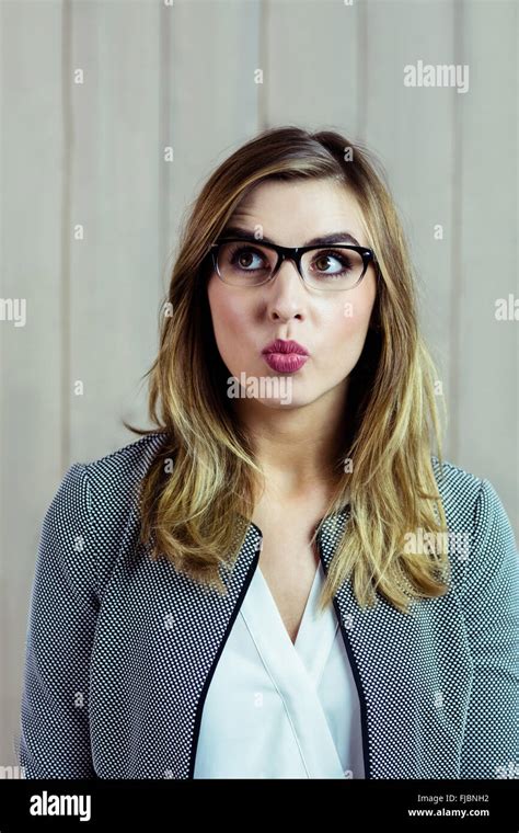 Pretty Blonde Woman Making A Funny Face Stock Photo Alamy