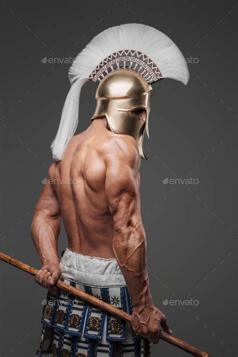 Ancient Greek Hoplite Standing With A Bare Muscular Torso Stock Photo