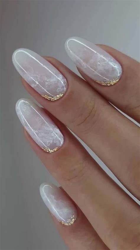 Elegant Gold Marble Almond Nails Artofit