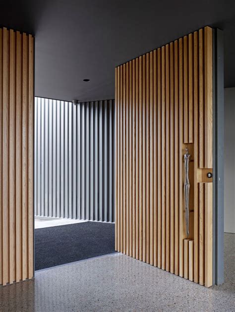 These 13 Sophisticated Modern Wood Door Designs Add A Warm Welcome