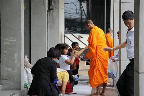 Why Buddhist monks collect alms and visit households even in times of social distancing