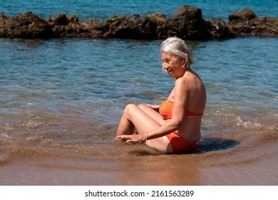 Older Woman In Bikini Over 465 Royalty Free Licensable Stock Photos