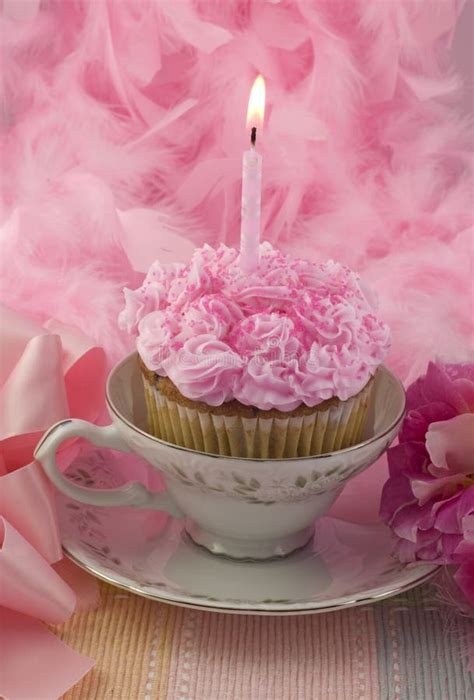 Pink Cupcake With Candle In Teacup Stock Image - Image: 10767775