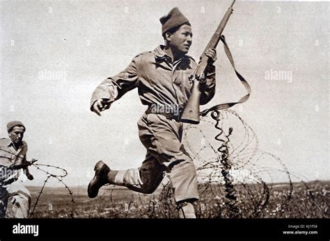 Greek soldier running during combat in the Greek civil War 1948 Stock Photo - Alamy