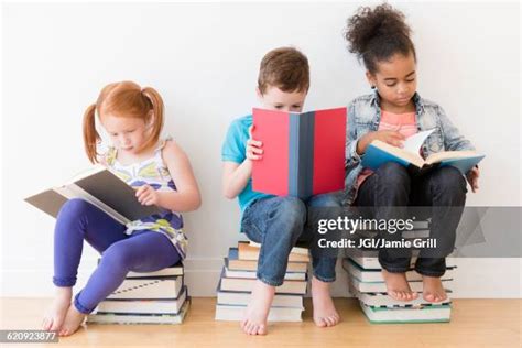 682 Barefoot Boy Reading Stock Photos, High-Res Pictures, and Images - Getty Images