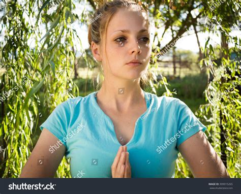 Sad Young Woman Praying Stance Under Stock Photo 399915265 Shutterstock