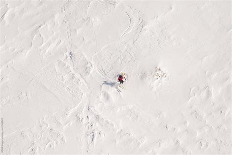 Male Skier Jumping While Freeriding On Steep Slope By Stocksy