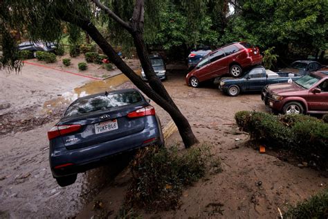 San Diegans cry, hug, outside damaged homes after stunning flash floods ...