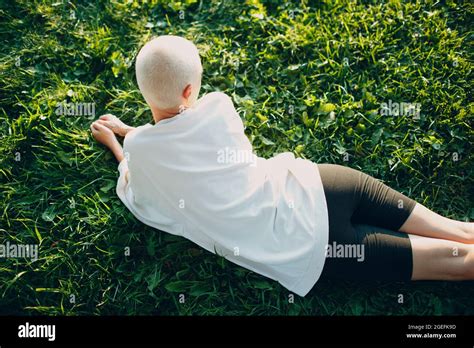 Portrait Of Young Smiling Millenial European Short Haired Woman Laying