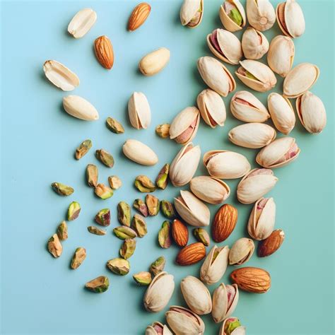 Premium Photo | A variety of nuts a superfood rich in nutrients ...