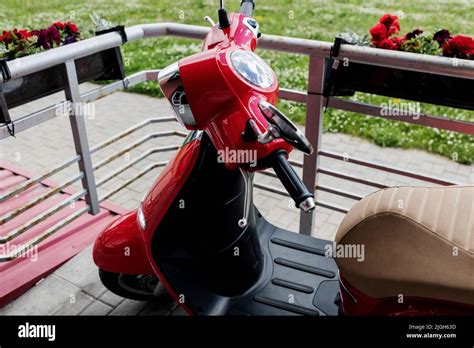 Red Scooter In Street Vintage Moped Stock Photo Alamy