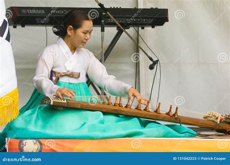 South Korean Female Musician Playing Stringed Instrument Editorial