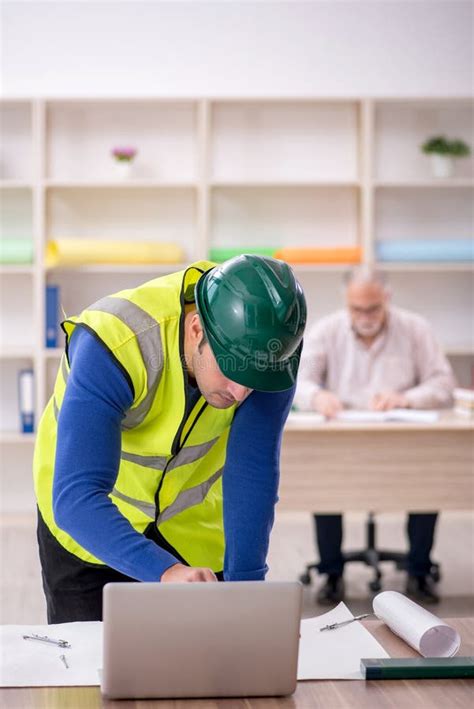 Two Male Architects Working On The Project Stock Photo Image Of