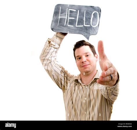 Portrait Of Male Saying Hello With Chalkboard Bubble Extending