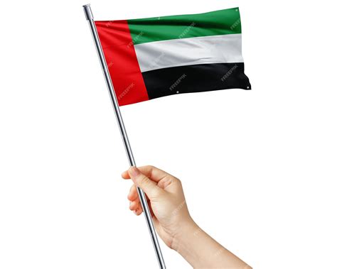 Premium Photo Hand Holding The United Arab Emirates Flag For National