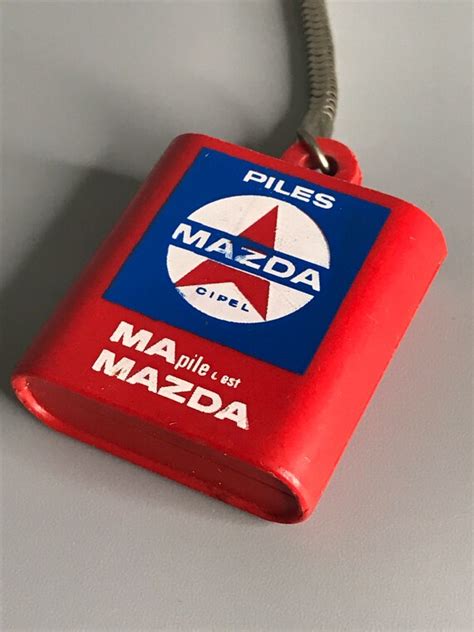 French Vintage Keychain Holder Mazda Advertising Pile Gem