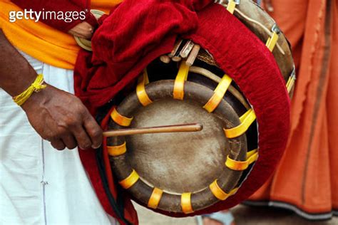 Indian Men Play Traditional Percussion Instrument Chenda Or Idakka In