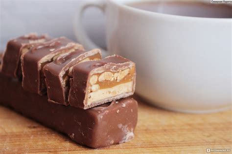 Шоколадный батончик Mars SNICKERS с жареным арахисом, карамелью и нугой ...