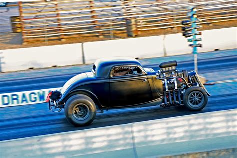 1933 Ford Coupe Powers Down The Strip With A Blown Hemi