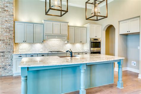 Gorgeous Open Concept Kitchen With Stainless Steel Appliances Granite Countertops And Off White