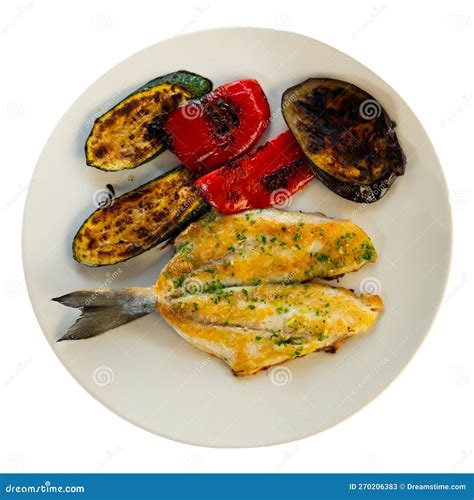 Baked Vegetables And Bream Fillet On Plate Dorada A La Plancha