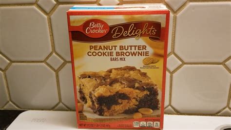 Making Yummy Betty Crocker Peanut Butter Cookie Brownies With Extra