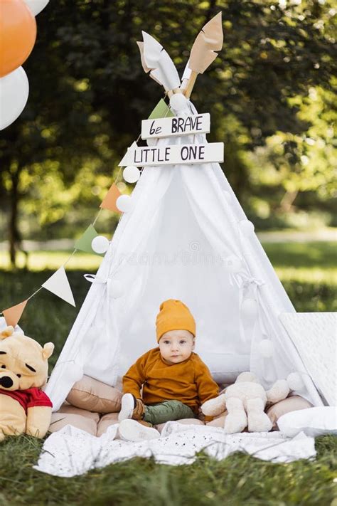Little Baby Boy Sitting Inside Colorful Teepee Tent Outdoors Stock ...