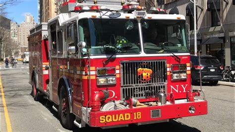 FDNY EMS UNIT 945 FDNY SQUAD 18 RESPONDING AGAINST TRAFFIC TO A 10 75