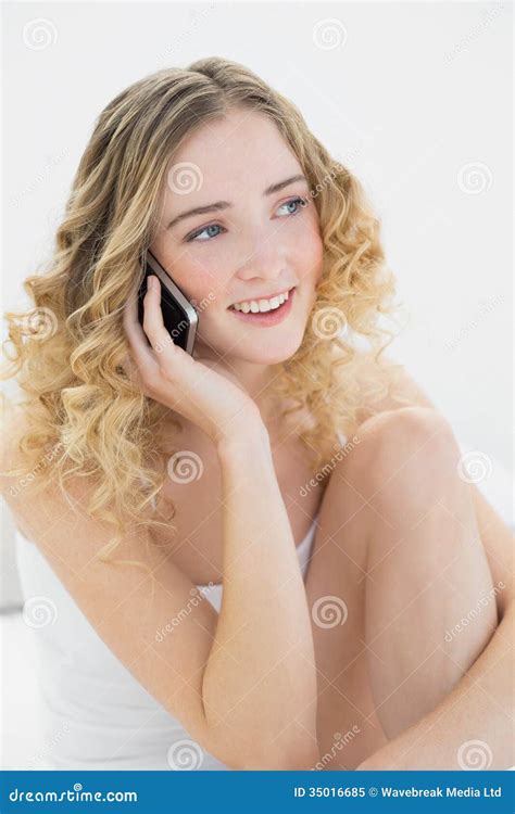 Pretty Cheerful Blonde Sitting On Bed Phoning Stock Image Image Of