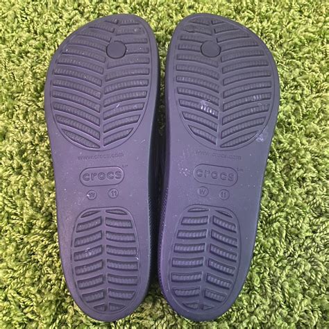 Crocs Women's Black Flipflops | Depop