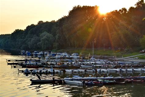 Imagen gratis muelle puesta de sol sol barco agua Río Ciudad