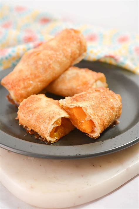 Peach Cobbler Egg Rolls CheekyKitchen