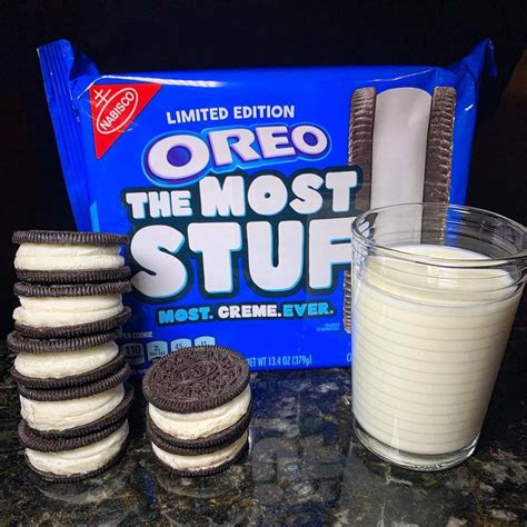 Oreo The Most Stuff Is Next To A Glass Of Milk And Cookies