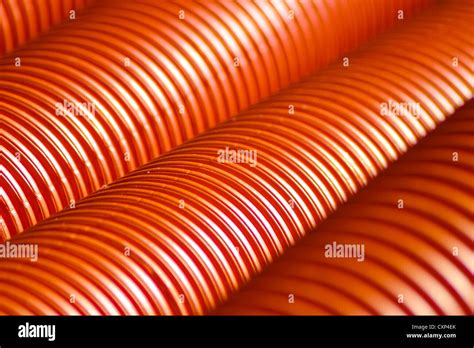 Brand New Orange Flexible Corrugated Plastic Conduit Pipes Await