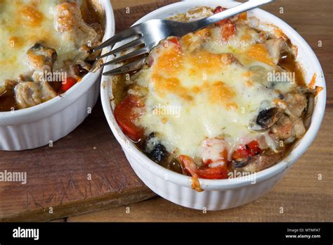 Individual oven dish of traditional Turkish Chicken casserole, Tavuc guvet Stock Photo - Alamy