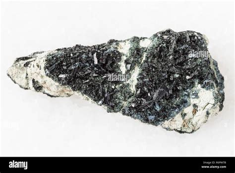 crystal of hornblende on amphibole-carbonate rock Stock Photo - Alamy