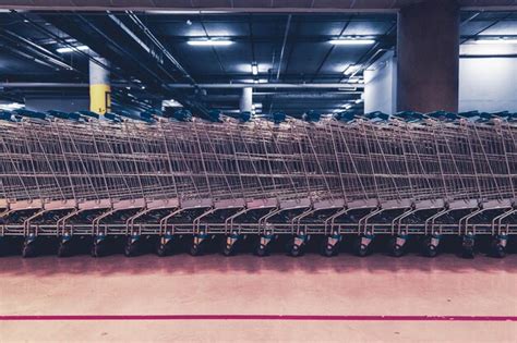 Premium Photo Shopping Carts Arranged At Underground