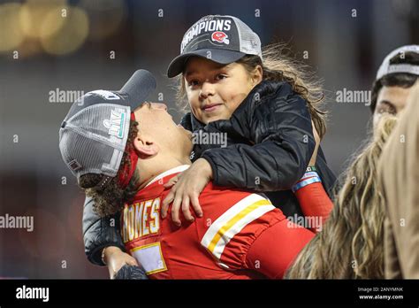 Kansas City Chiefs quarterback Patrick Mahomes (15) holds his sister ...