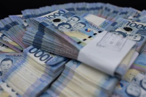 A Pile Of One Thousand Philippines Peso Banknotes Cash Of Thousand