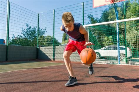 Boy Teenager Playing Basketball in City Basketball Court Stock Photo - Image of outside, play ...