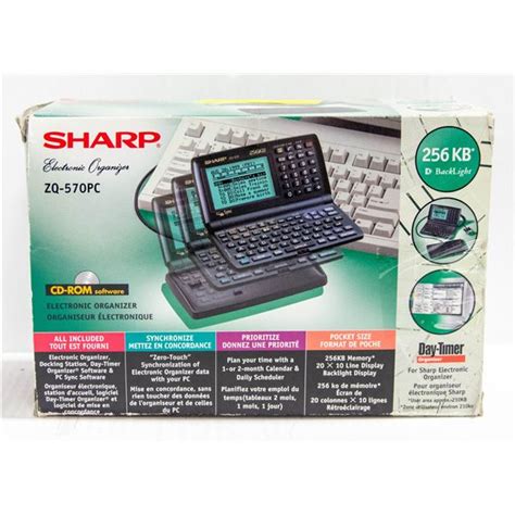 NEW "SHARP" ELECTRONIC ORGANIZER