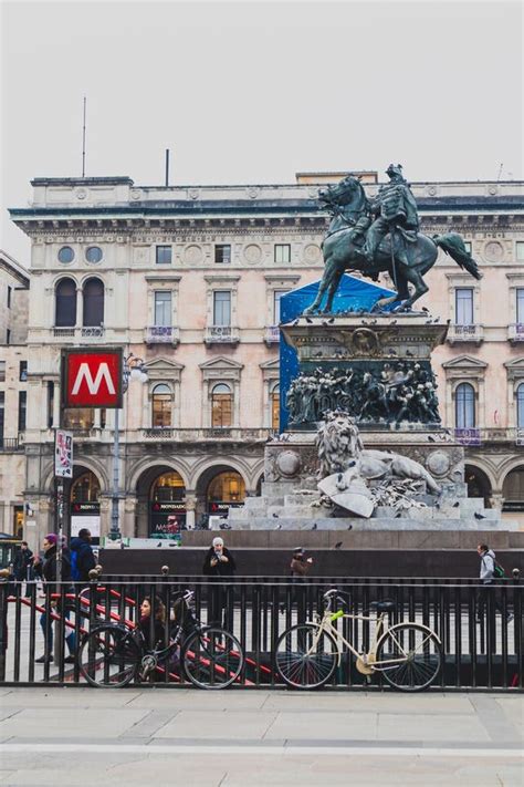 Detail Of Statue And Subway Entrance In Piazza Del Duomo In Milan City