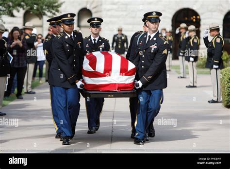 The Arizona Army National Guard’s Military Funeral Honors Team carries ...