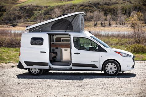 This Micro Camper Van Features A Pop Top Roof And A Stylish Well