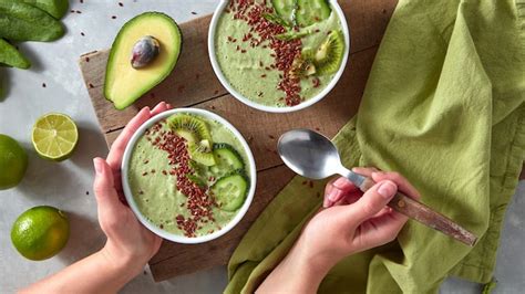 Premium Photo The Woman S Hands Hold A Spoon And A Plate With Healthy