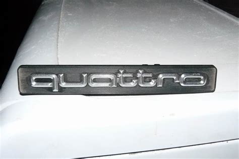Шильдик QUATTRO — Audi 200 (C3), 2,1 л, 1985 года | аксессуары | DRIVE2