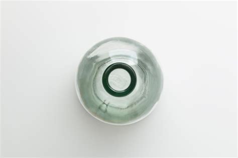 Premium Photo Top View Of Glass Bottle On White Background