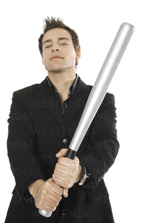 Young Man Holding Baseball Bat Close Up Stock Photo