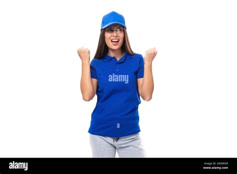 Joyful Pretty Young Brunette Woman In Blue Cap And T Shirt With Print